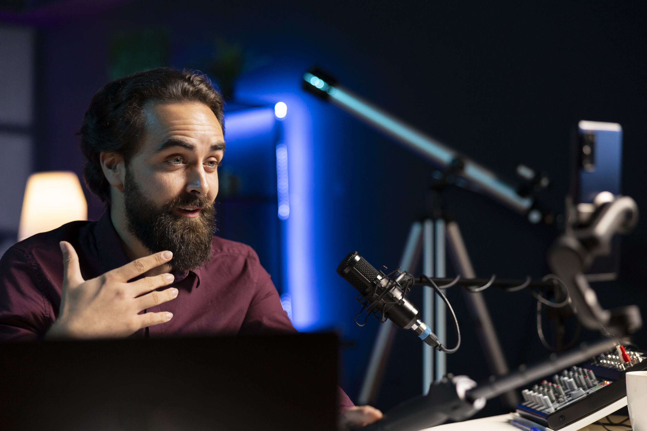 man using professional recording equipment to film vlog channel intro for internet platforms